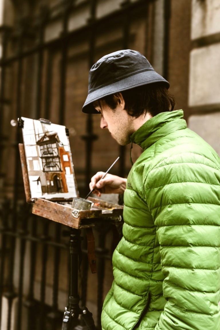Artist painting outdoors